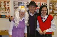 Fifinka, Myšpulín, and their author at the signing ceremony 